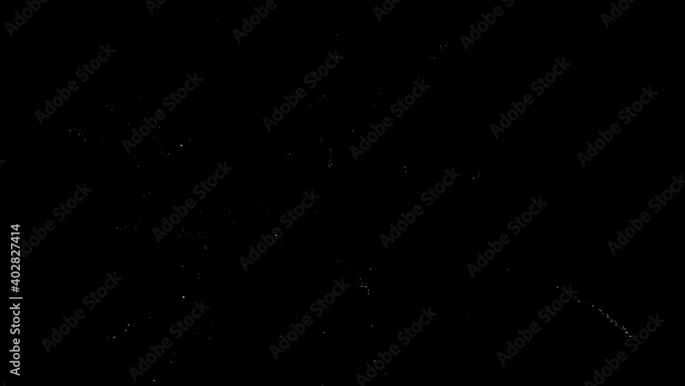 Festive background.Fireworks exploding brightly against the dark sky Festive background.Fireworks exploding brightly against the dark sky