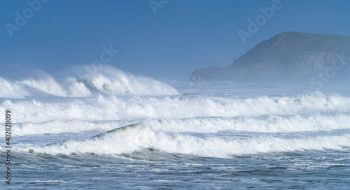 Swell in the Cantabrian Sea in the area of Cabo Oyambre between San Vicente de la Barquera and Comillas. Oyambre Natural Park, Cantabria, Spain, Europe photo