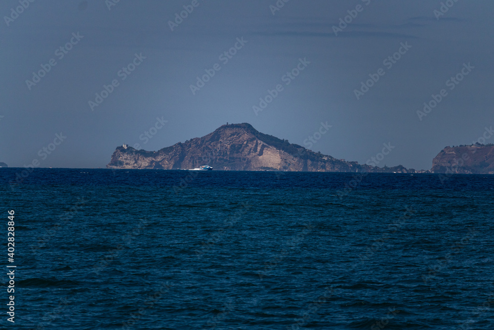 view of the island of Ischia from the sea view of the island of Ischia from the sea
