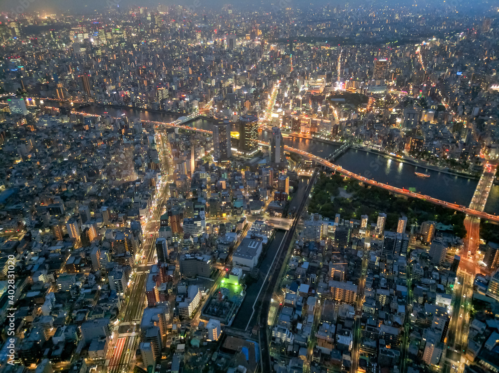 TOKYO, JAPAN - APRIL 3, 2018: View from the Skytree TV tower to the city of Tokyo. Dense urban development with high-rise buildings. Very beautiful from above.