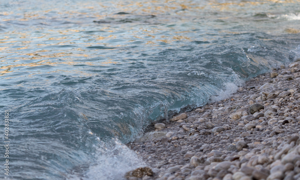 sea waves on a stone beach on the beach of Capri sea waves on a stone beach on the beach of Capri