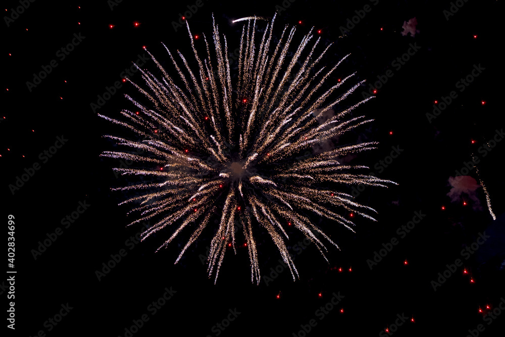 Background of fireworks exploding in the sky at night to celebrate holiday Background of fireworks exploding in the sky at night to celebrate holiday