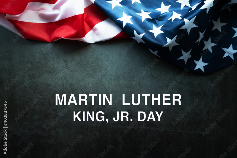 Fototapeta premium Martin Luther King Day Anniversary - American flag on abstract background