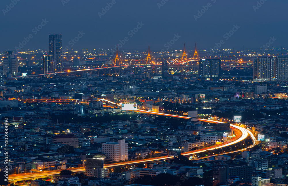 Bhumibol Bridge 1 and Bhumibol Bridge 2 with night cityscape and toll way of Bangkok in last day of year.
