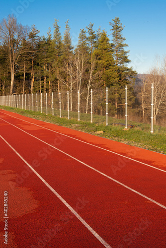 Athletic tartan covered running track.