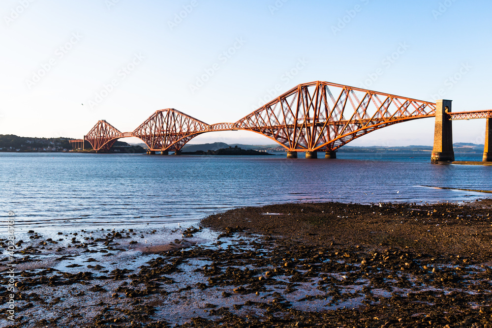 Naklejka premium A nice clear sky view to the beautiful Forth Bridge in scotland wich connects South- and North Queenferry.
