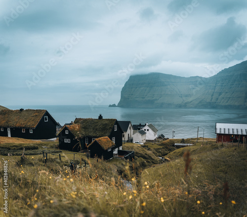 Village of Mikladalur located on the island of Kalsoy, Faroe Islands, Denmark photo