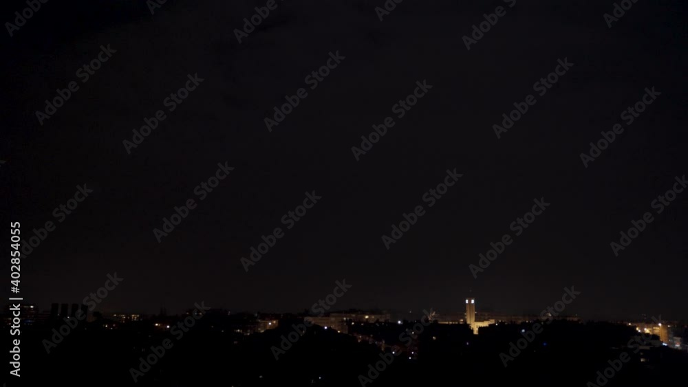 Fireworks over the city of Brussels on New Year's Eve 2020-2021. Despite the firework ban due to corona (Covid-19) restrictions in Belgium. Wide angle Fireworks over the city of Brussels on New Year's Eve 2020-2021. Despite the firework ban due to corona (Covid-19) restrictions in Belgium. Wide angle