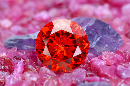 ruby red diamonds on raw ruby rough gemstone photo