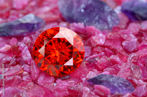 ruby red diamonds on raw ruby rough gemstone photo