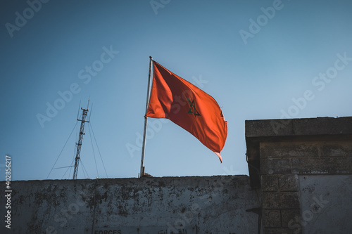 Fototapeta Naklejka Na Ścianę i Meble -  National flag of Morocco waving in the wind