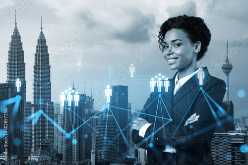 Photography Smiling black woman HR director at international company is thinking about recruitment of highly qualified specialists