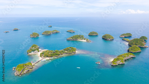 Seascape, a group of small islands, top view. National Park, Alaminos, Pangasinan, Philippines.