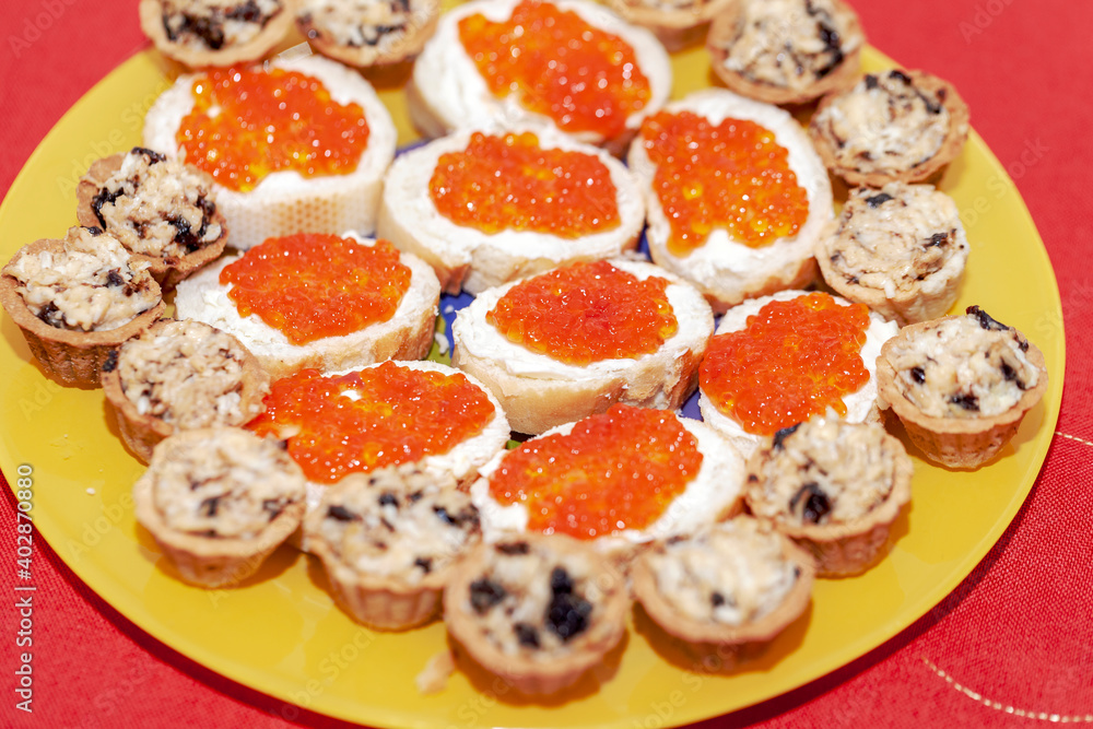 Russian feast. Sandwiches with red caviar Russian feast. Sandwiches with red caviar