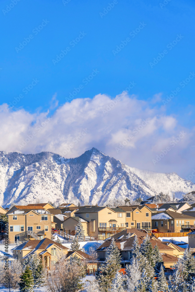 Amazing views of snowy mountain and cloudy sky in Highland Utah neighborhood