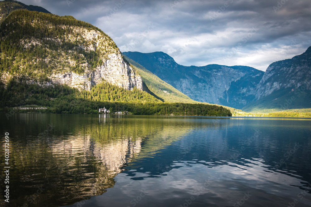 reflections of lake hallstatt, mountains, austria