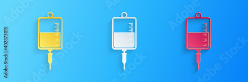 Paper cut IV bag icon isolated on blue background. Blood bag icon. Donate blood concept. The concept of treatment and therapy, chemotherapy. Paper art style. Vector.