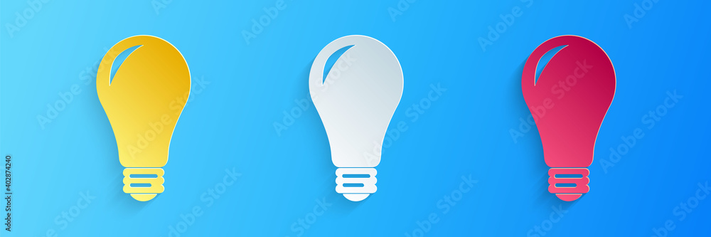 Paper cut Light bulb icon isolated on blue background. Energy and idea symbol. Lamp electric. Paper art style. Vector. Paper cut Light bulb icon isolated on blue background. Energy and idea symbol. Lamp electric. Paper art style. Vector.