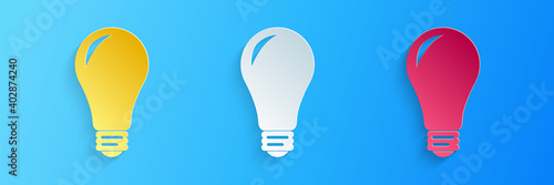 Paper cut Light bulb icon isolated on blue background. Energy and idea symbol. Lamp electric. Paper art style. Vector.