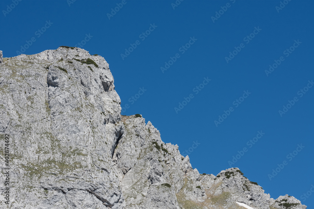 rugged mountain with dark blue sky detail view