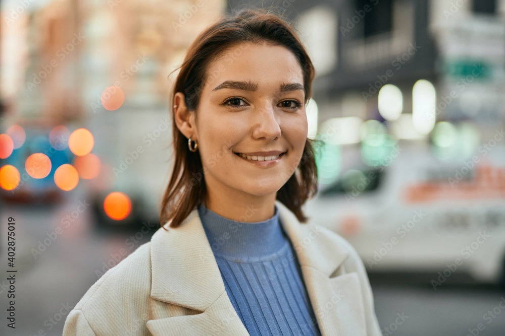 Young hispanic woman smiling happy standing at the city Young hispanic woman smiling happy standing at the city