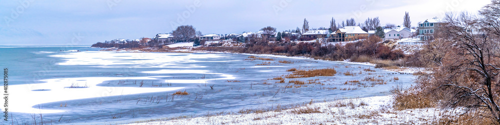 Panoramic view of scenic Utah Lake with frozen water on a snowy winter day Panoramic view of scenic Utah Lake with frozen water on a snowy winter day