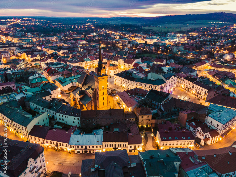 Old Town, City Square and Cathedral Church in Tarnow, Poland. Aerial Drone Skyline at Twilight