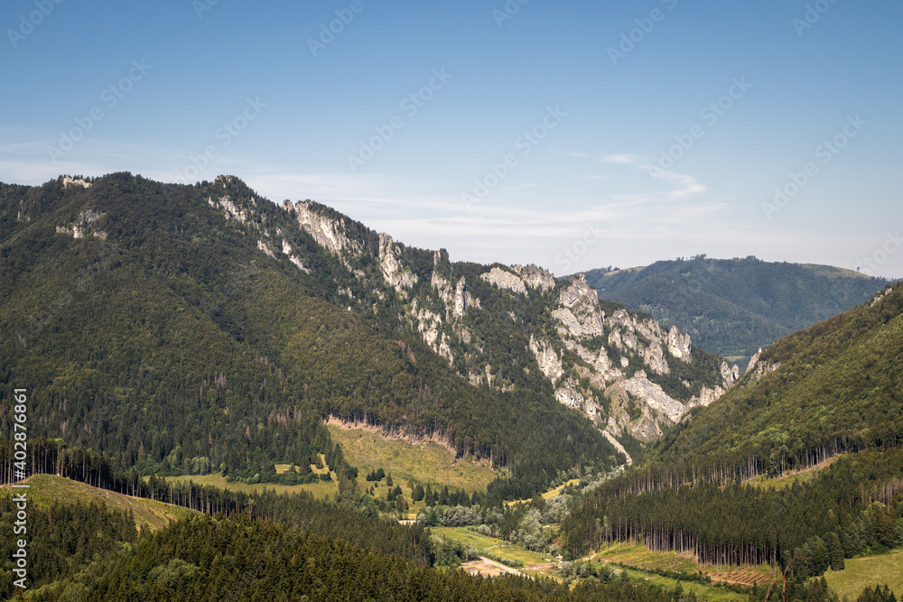 Rocky mountains know as Tiesnavy and Vratna Dolina valley in Natural park Mala Fatra, Slovakia. Beautiful view at mountain and forest with clear sky at summer