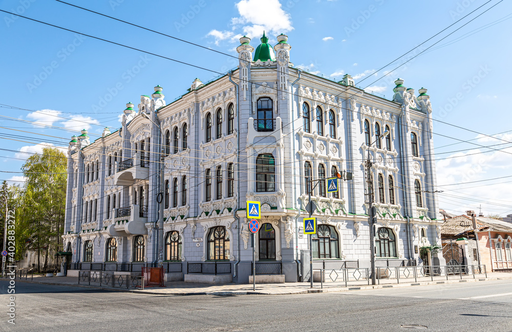 Historic stone building with architectural decorations (1904)