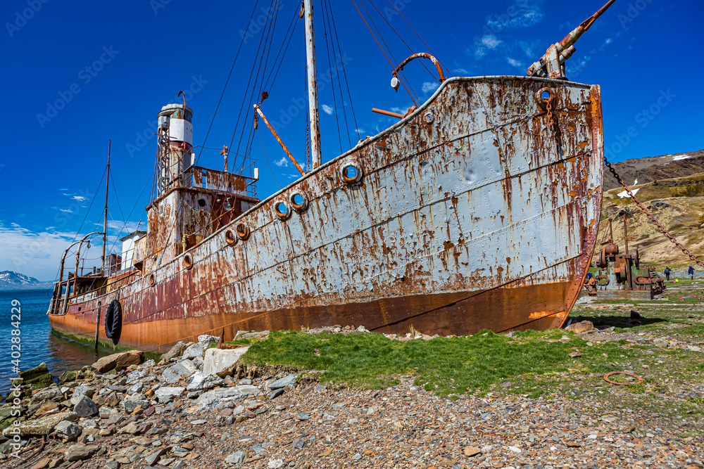 Rusting whaling ship decays on shore in Grytviken, South Georgia