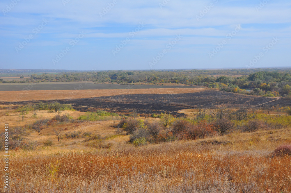 Burnt field. Consequences of fires in autumn 2020 in the Rostov region. Russia