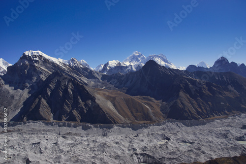 View from Gokyo Ri on Mount Everest, ngozumpa glacier, cho la, lobuche west, kala patter and louche east. photo