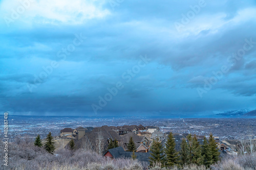 The Salt Lake City panoramic scenery with homes downtown and mountain views