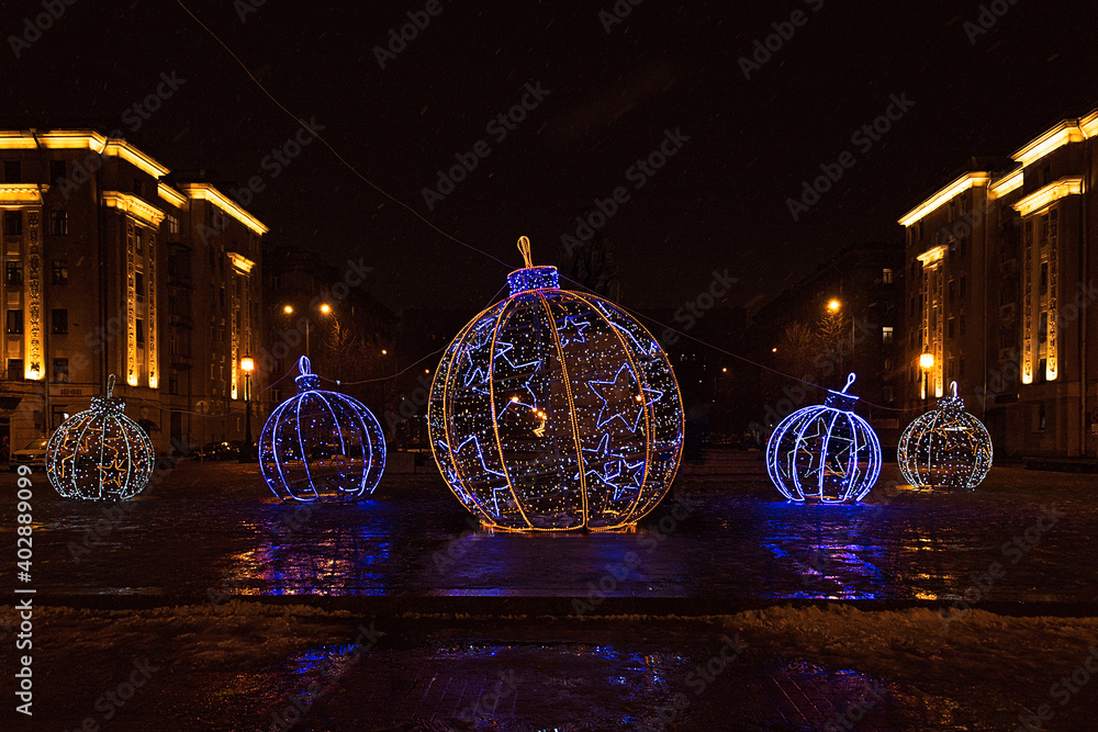 Christmas decorated city of St. Petersburg, Russia. Large glowing Christmas balls.