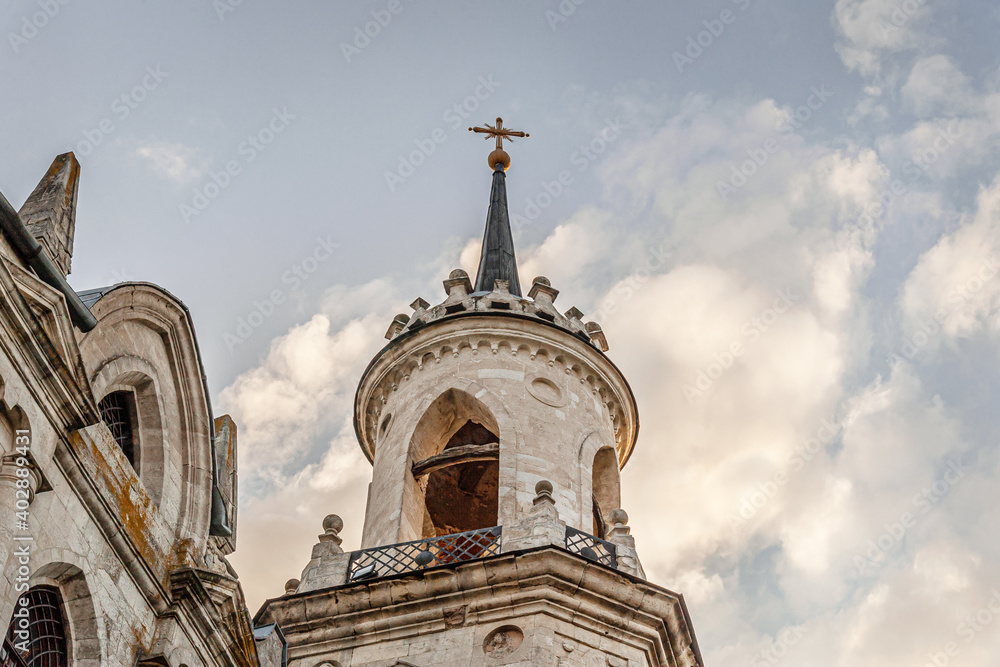 orthodox church of 18th century built in gothic style against a cloudy sky. Bykovo, Moscow Region, Russia orthodox church of 18th century built in gothic style against a cloudy sky. Bykovo, Moscow Region, Russia