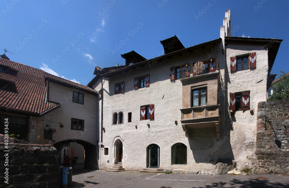 Medieval Hohes Haus residential building with renaissance oriel window in the old town of Merano, South Tyrol in Italy