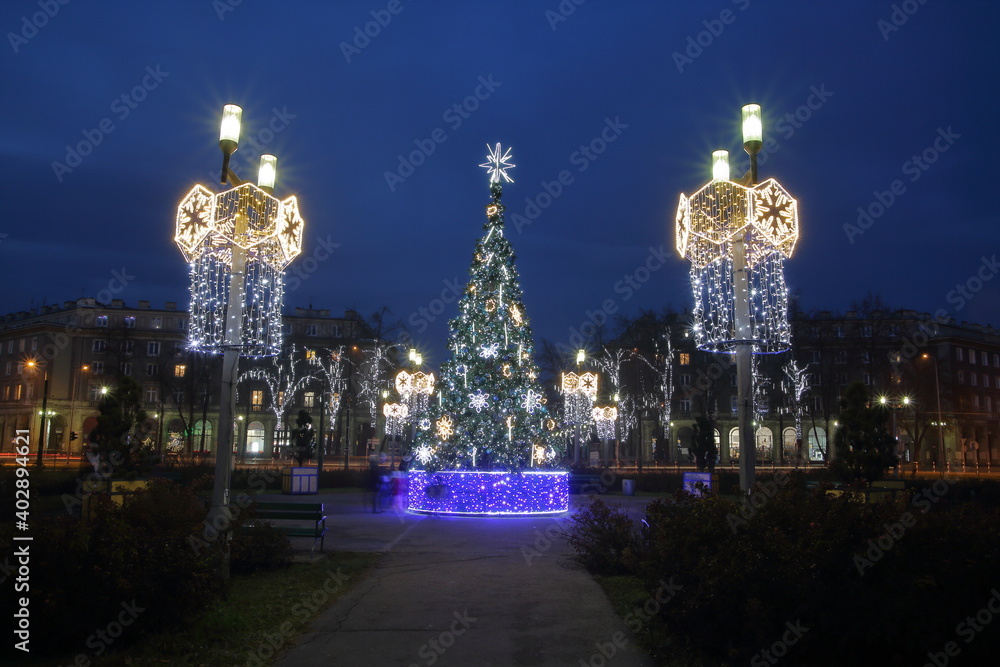 city night view, Christmas tree and street illuminations decorate square city night view, Christmas tree and street illuminations decorate square