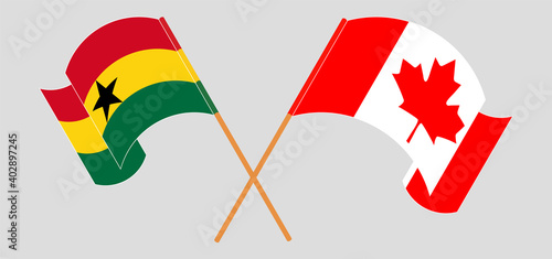 Crossed and waving flags of Ghana and Canada