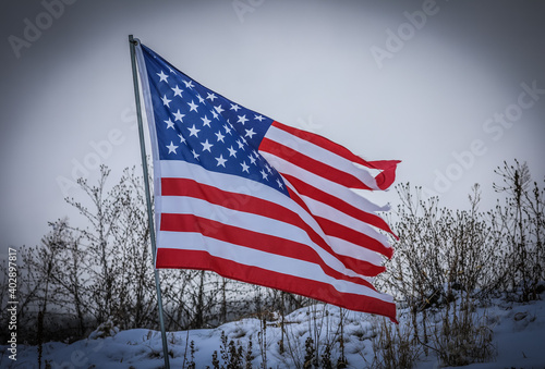 american flag in the snow