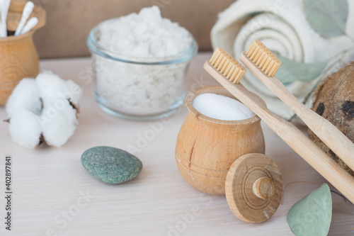 Beauty eco cosmetics zero waste, spa setting, composition with Dead sea salt, coconut, natural cosmetic blue clay, soda, loofah. Flat lay, Spa concept with cotton flower, stones and towel.