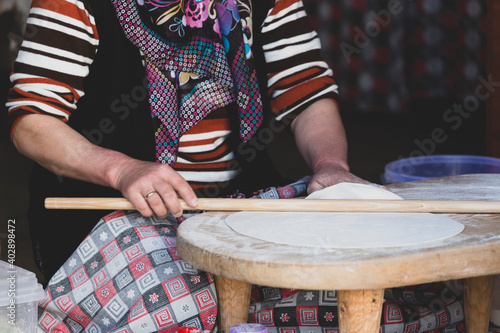 A peasant woman who makes gozleme with cheddar cheese photo