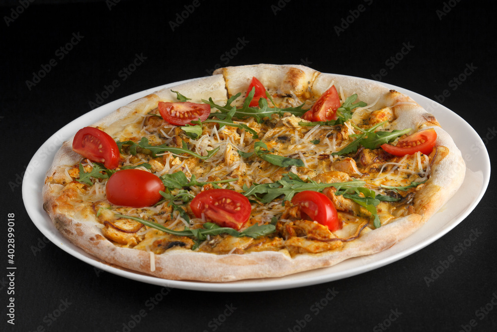 fragrant and hot pizza on a dark background fragrant and hot pizza on a dark background