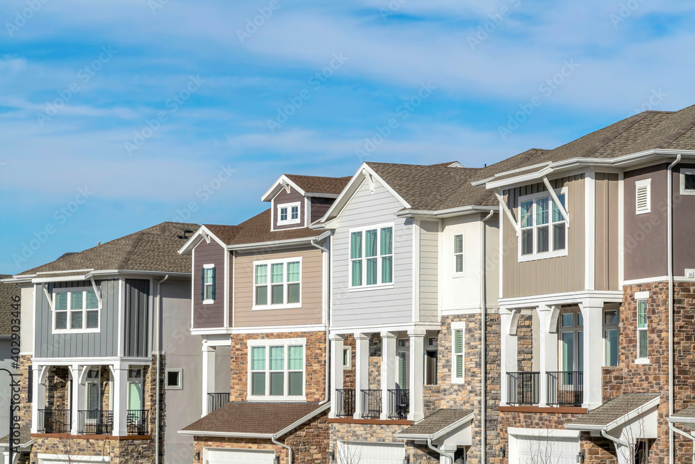 Townhouses in Utah Valley with balconies garages and stone brick and wood walls Townhouses in Utah Valley with balconies garages and stone brick and wood walls