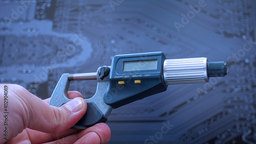 Еnegineer working with precise micrometer with digital display for quality control. Close up horizontal video of accurate measuring instrument. Micrometer tool showing the exact diameter and thickness