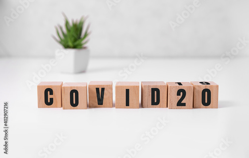 the word covid20 . Beautiful grey background. Concept. Copy space photo