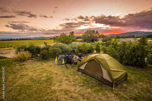 Camping in a tent on the nature with bikes