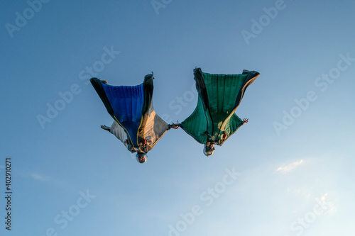 Wingsuit fliers glide over Swiss Alps