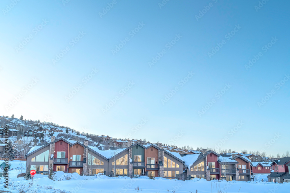 Facade of mountain homes on a snowy winter setting in Park City Utah
