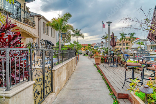 Waterfront houses and walkway along the dreamy canal in Long Beach California © Jason