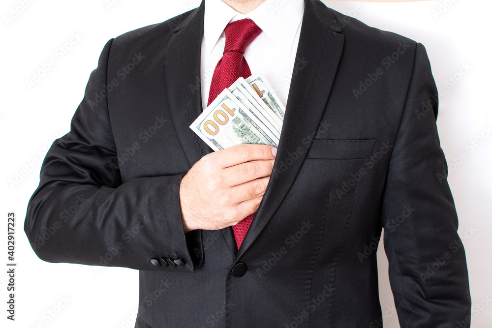 Closeup of businessman's hands with US dollar bills. White background. Closeup of businessman's hands with US dollar bills. White background.